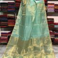 Tissue Linen Saree Golden Zari Border with Model and Some saree in background