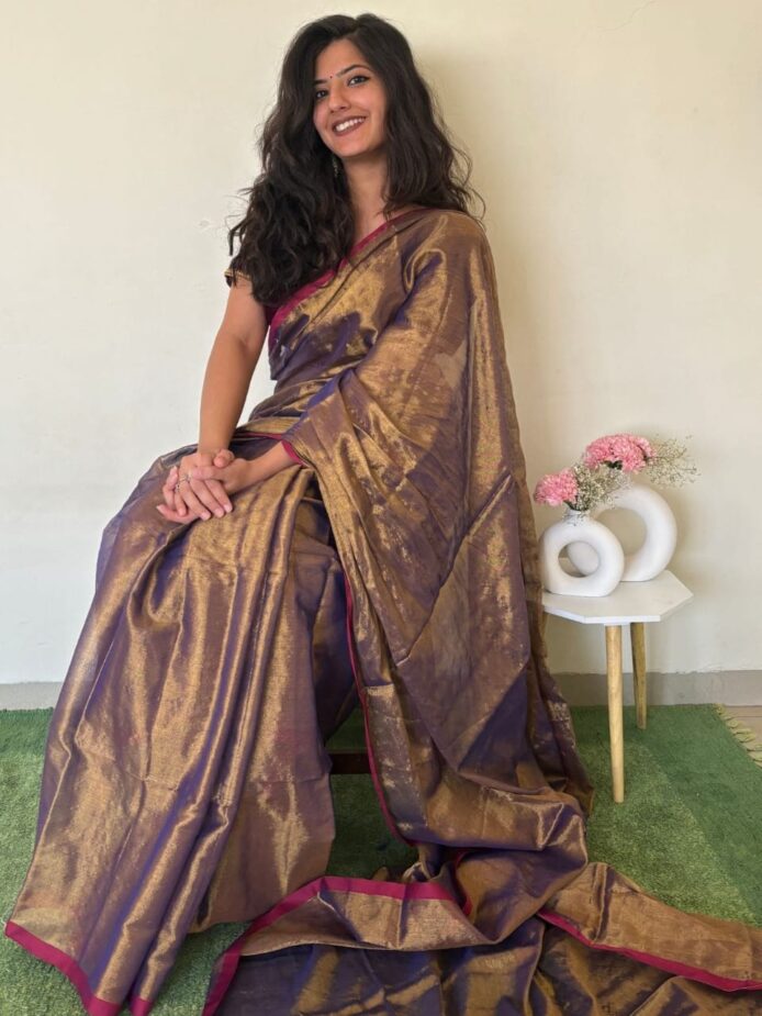Pure Linen Tissue Sarees with Model and Table pot in picture