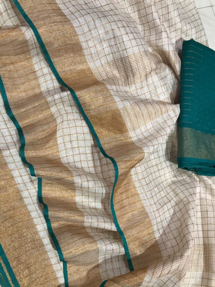 Fabric: 50% Linen and 50% Cotton Quality: Premium Saree Colour: Off-white Pattern: Weaving Zari Check Saree Length: 5.5 meters Blouse Length: 1 meter (Unstitched) Wash Care: 1. Kindly hand wash it separately. 2. No machine wash. Avoid direct sunlight: It's best to store them in a cool, dry place away from sunlight. Disclaimer: Actual colours may vary. This is because every monitor/screen can display colours differently. We try to edit our photos to show the samples as life-like as possible, but please understand the actual colour may vary slightly from your monitor. We cannot guarantee that the colour you see portrays the product's true colour.