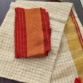 Off-White Linen Check Saree with Red Blouse