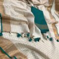 Fabric: 50% Linen and 50% Cotton Quality: Premium Saree Colour: Off-white Pattern: Weaving Zari Check Saree Length: 5.5 meters Blouse Length: 1 meter (Unstitched) Wash Care: 1. Kindly hand wash it separately. 2. No machine wash. Avoid direct sunlight: It's best to store them in a cool, dry place away from sunlight. Disclaimer: Actual colours may vary. This is because every monitor/screen can display colours differently. We try to edit our photos to show the samples as life-like as possible, but please understand the actual colour may vary slightly from your monitor. We cannot guarantee that the colour you see portrays the product's true colour.