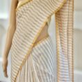 Off White Linen Saree Copper Zari Border Onam Festival Wear