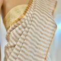 Off White Linen Saree Copper Zari Border Onam Festival Wear