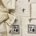 Khadi cotton embroidery salwar suit material with vibrant tribal folk art work on top & dupatta – perfect for festive, party & wedding wear. Aamir Fashion Textile.