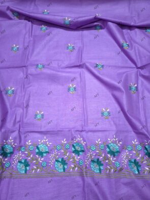 Unstitched Cotton Salwar Suit with Dupatta on the floor with flower pot