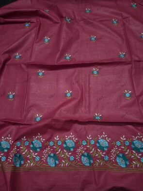 Cotton Embroidered Salwar Suit Material on floor with Flower pot