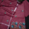 Cotton Embroidered Salwar Suit Material on floor with Flower pot