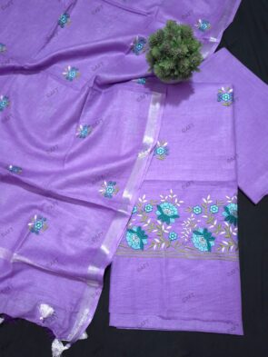 Unstitched Cotton Salwar Suit with Dupatta on the floor with flower pot