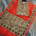 Tussar Ghicha Silk Madhubani Painting Dress Material on the floor with Budhdha Toy