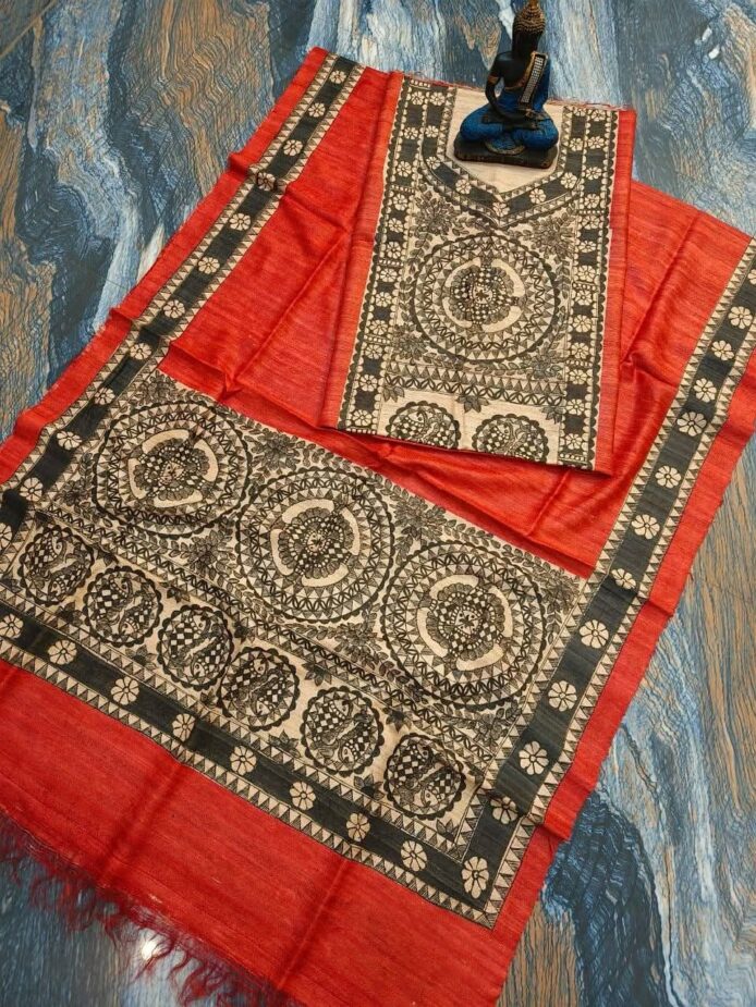 Tussar Ghicha Silk Madhubani Painting Dress Material on the floor with Budhdha Toy