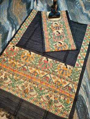 Tussar Ghicha Silk Madhubani Painting Dress Material on the floor with Budhdha Toy