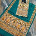 Tussar Ghicha Silk Madhubani Painting Dress Material on the floor with Budhdha Toy